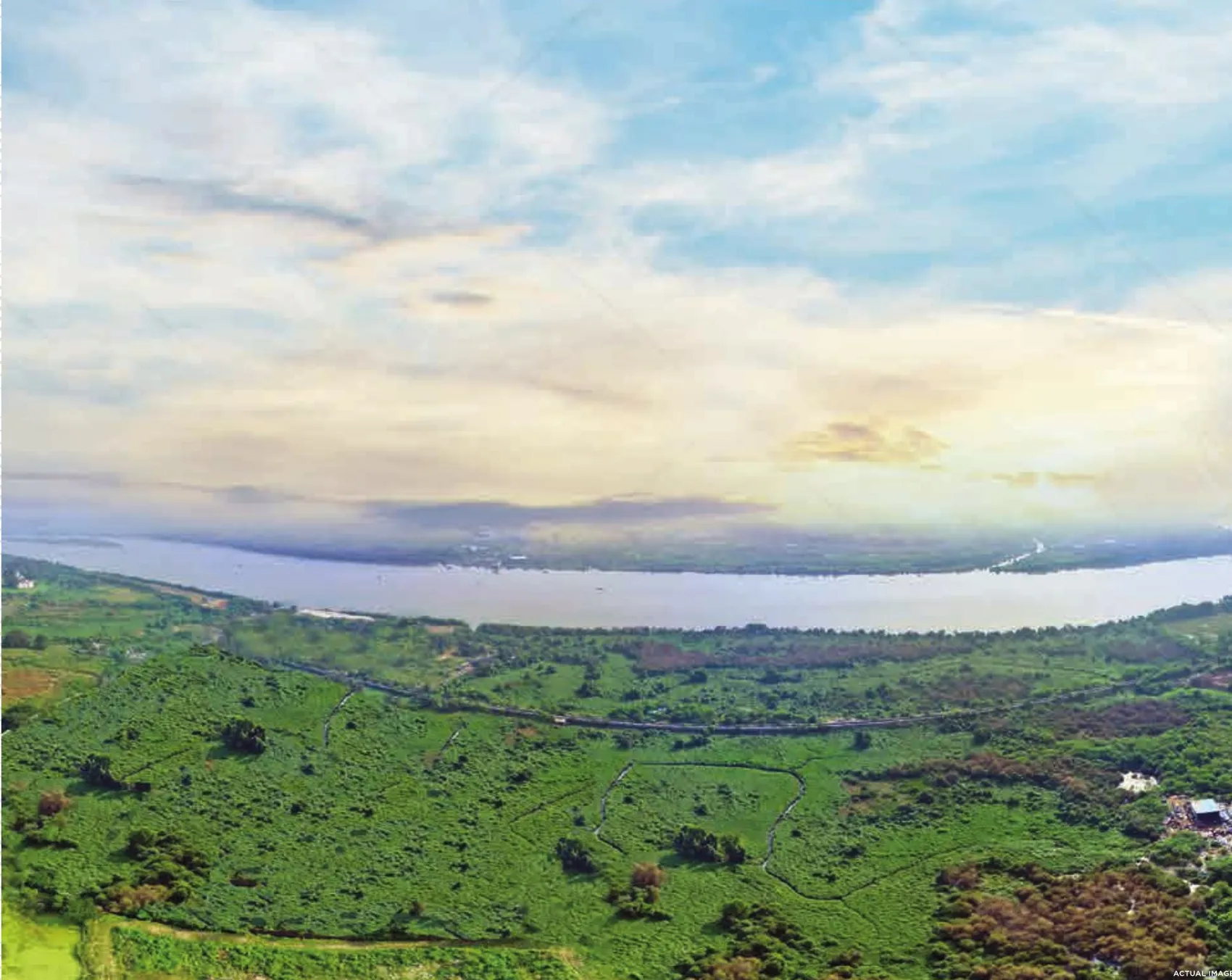 Green landscape and the Ulhas river near Kolshet, representational image